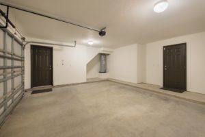 2 Car Garage with electric garage door and Entry to Townhouse