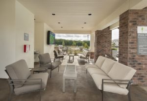 Community Outdoor Entertainment Area with Outdoor Couches