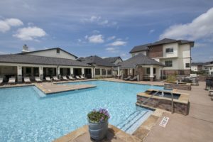 Community Outdoor Pool with Outdoor Grill and Picnic area